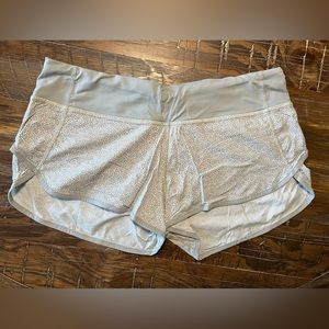 Lululemon speed up low rise shorts. Size 8. Grey with white detail.